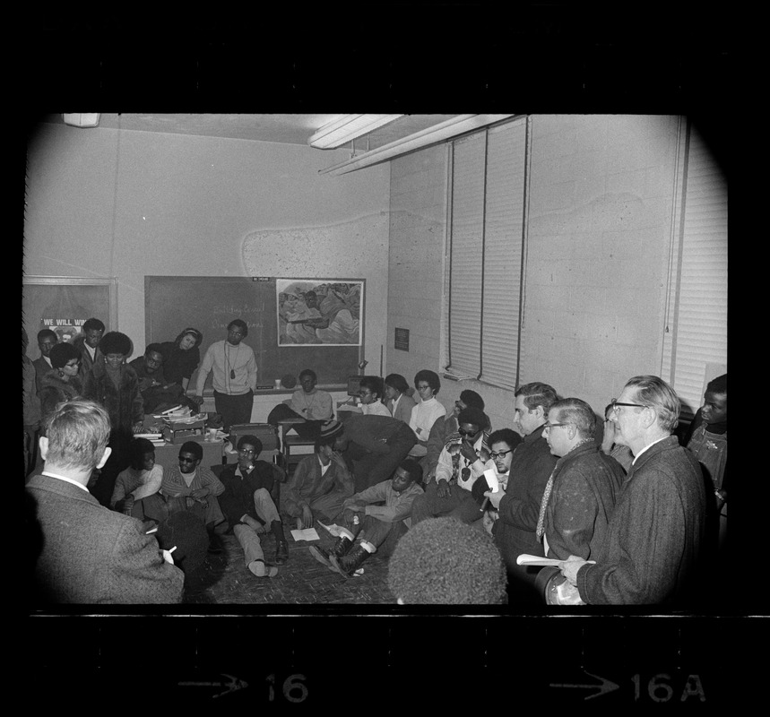 Black students at Brandeis University during protest meet in a classroom with university officials
