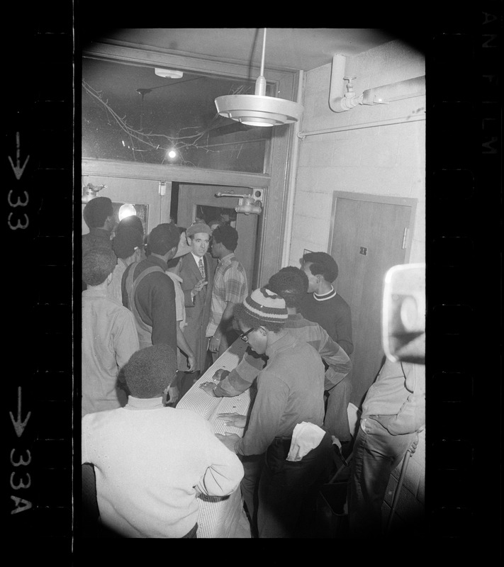 Brandeis University president, Morris Abram, arrives at seized Ford Hall during Black student protest