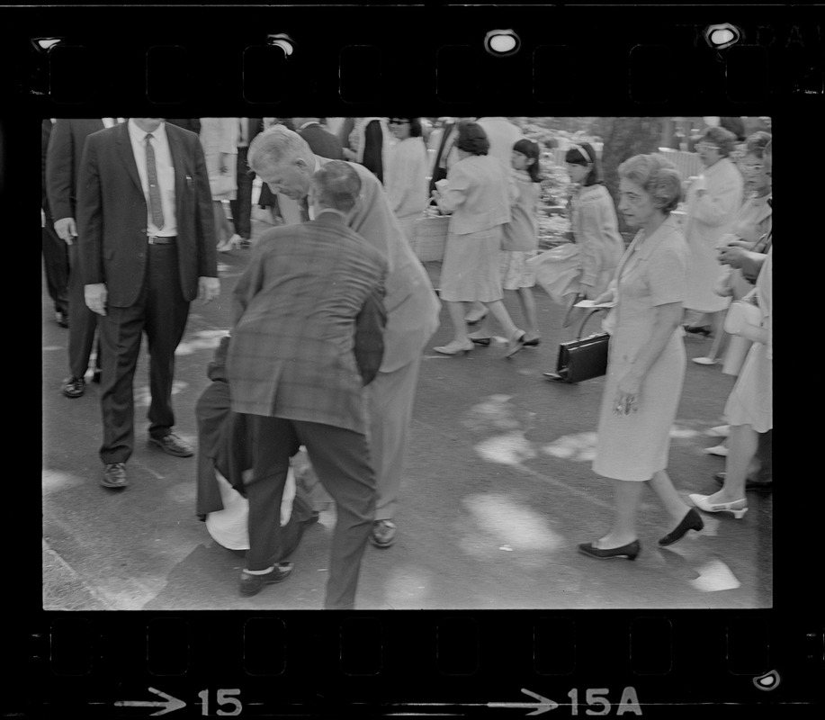 Screaming, Stephen Golin, 26 of Leach Lane, Natick, a graduate student and Ph.D candidate is dragged from Brandeis University Campus by Det. Arthur McGonigle of the Waltham Police and another detective after Golin refused to stop passing out anti-Vietnam war literature at the commencement exercises