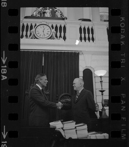 Judge Edward F. Hennessey takes oath of higher level of office from Governor Francis Sargent at the Senate Chambers in the State House