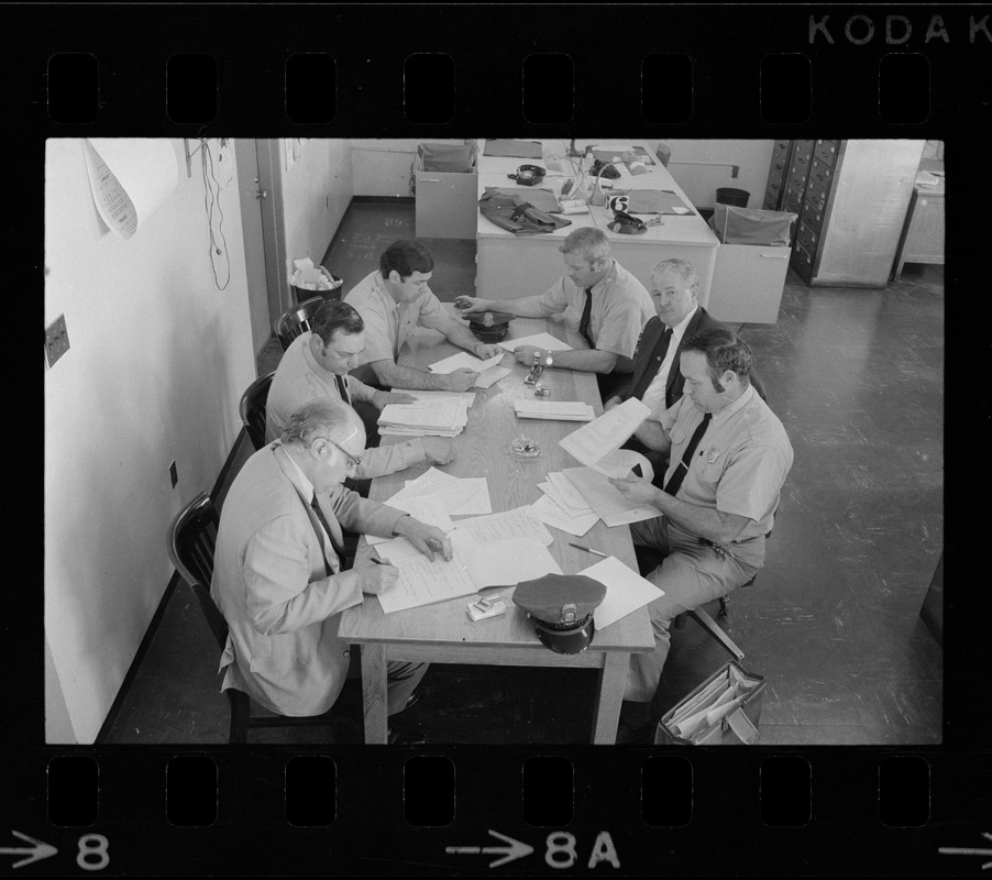 Sunday Advertiser reporter Jim Morse (far left) conducts exclusive interview at Walpole State Prison with correctional officers who gave their side of the story about prison unrest