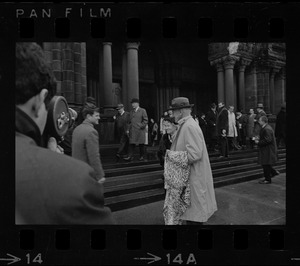 Senator Leverett Saltonstall and his wife Alice leaving Trinity Church Copley Square after the memorial service for former governor Christian A. Herter