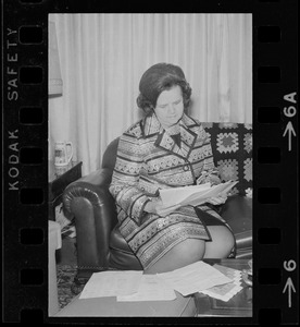 US Representative Louise Day Hicks reading through papers during her campaign primary for mayor