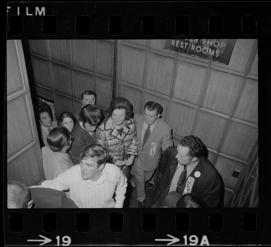 US Representative Louise Day Hicks on staircase surrounded by supporters during her primary race for mayor