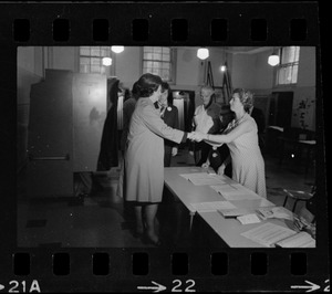 Mrs. Louise Day Hicks shaking hands with a poll worker on election day of her primary race for mayor