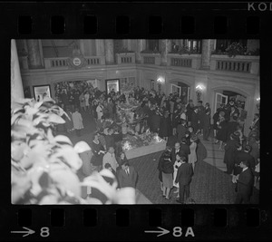 Crowd inside the Sack Theater lobby for the film premiere of "Camelot"