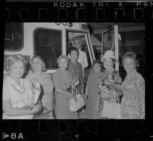 Society editors attending a meeting in Boston of the Society of American Social Scribes board a Bonanza bus for a tour to Newport, R.I.