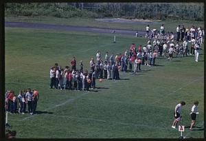 Groups on field at Dilboy Stadium, Somerville, Massachusetts
