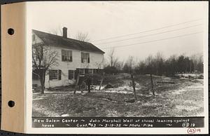 Contract No. 43, Extension of Belchertown-Pelham Highway to New Salem Center, Shutesbury, New Salem (Franklin County), New Salem Center, John Marshall well at shovel leaning against house, New Salem, Mass., Mar. 19, 1935