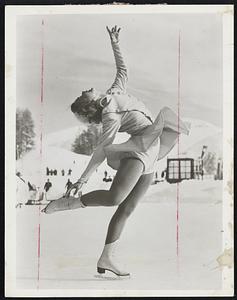 Barbara Ann Scott, noted young Canadian skater, displaying the style that helped her win the World's Championship in figure skating. Miss Scott has just written a new book, Skate With Me, which in text and easy-to-follow diagrammatic drawings, explains the technique of skating. Skate With Me will be published by Doubleday on December 7.