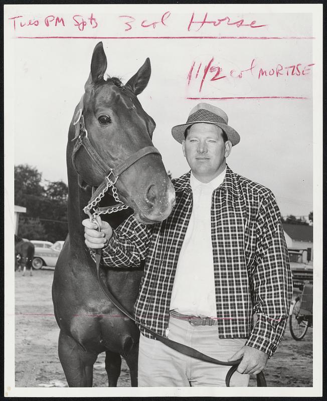 The Range. A year ago today this horse, Good Bird, roamed the wilds of Western Colorado where cowpokes called him "The Ghost of the Range." Today The Bird is one of the top horses at Rockingham. He is shown here with trainer L.E. Seba.