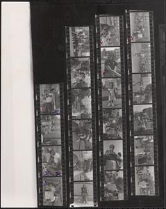 Contact sheet with 22 images, many most likely taken at a neighborhood party in Newtowne Court