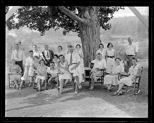 A group of unidentified people posing for a photograph