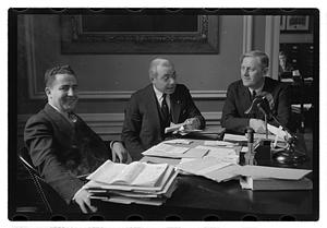Three unidentified men