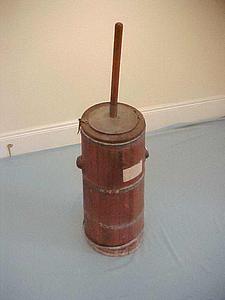 Wooden butter churn with lid