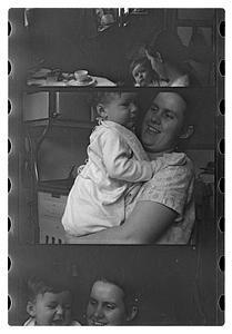 Maude Sanromá holding a child