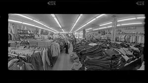 Shopping at discount jeans store, Central Square, Boston