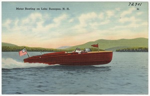 Motor boating on Lake Sunapee, N.H.