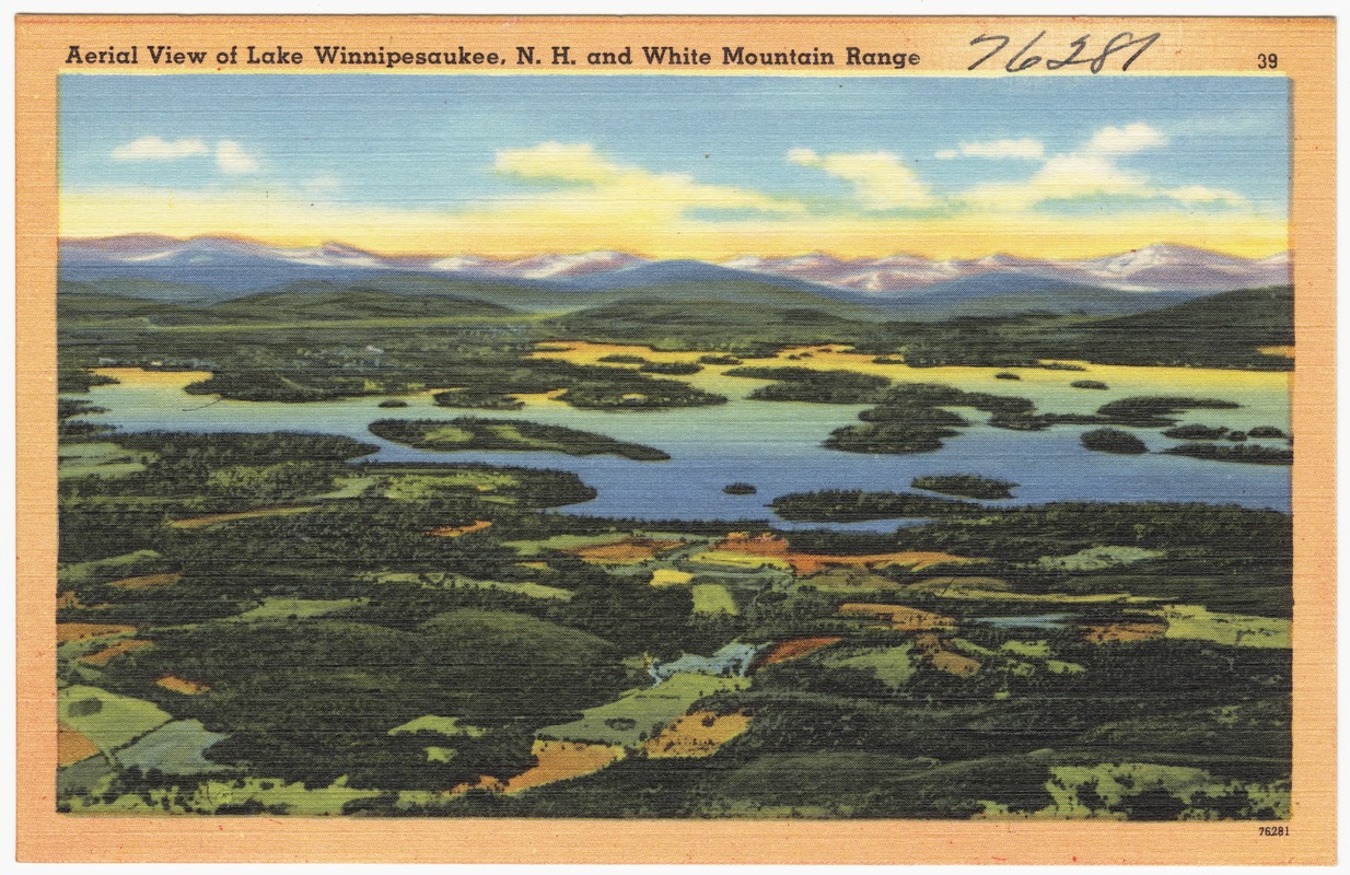 Aerial view of Lake Winnipesaukee, N.H. and White Mountain Range