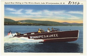 Speed boat riding at the Weirs Beach, Lake Winnipesaukee, N.H.