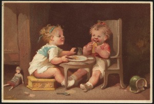 Two children eating.