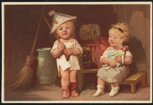 Two children - one playing soldier, one holding a doll.