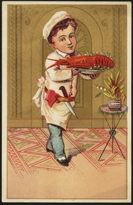 Boy dressed as a chef holding a lobster on a plate