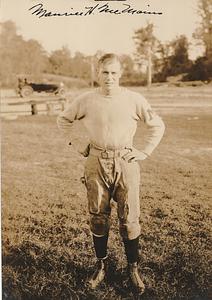 Maurice H. McMains in football uniform, Marine base Quantico, VA