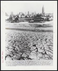 Ice Floes in the Boston-- This view of ice floes in the Hudson River was made from the liner Liberte which was delayed two hours in reaching its berth at Pier 88, background. In distant background is Empire State building towering over Manhattan skyline.