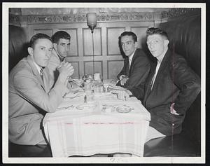 Three Indian Pitchers and Friend- These hungry Cleveland ball players didn't waste time getting to their favorite off-field pastime of eating when they arrived at Hotel Kenmore. From the left, Ray Narleski, Don Mossi, Dick Tomanek and John Reardon. Indians open series with Sox tonight at Fenway.