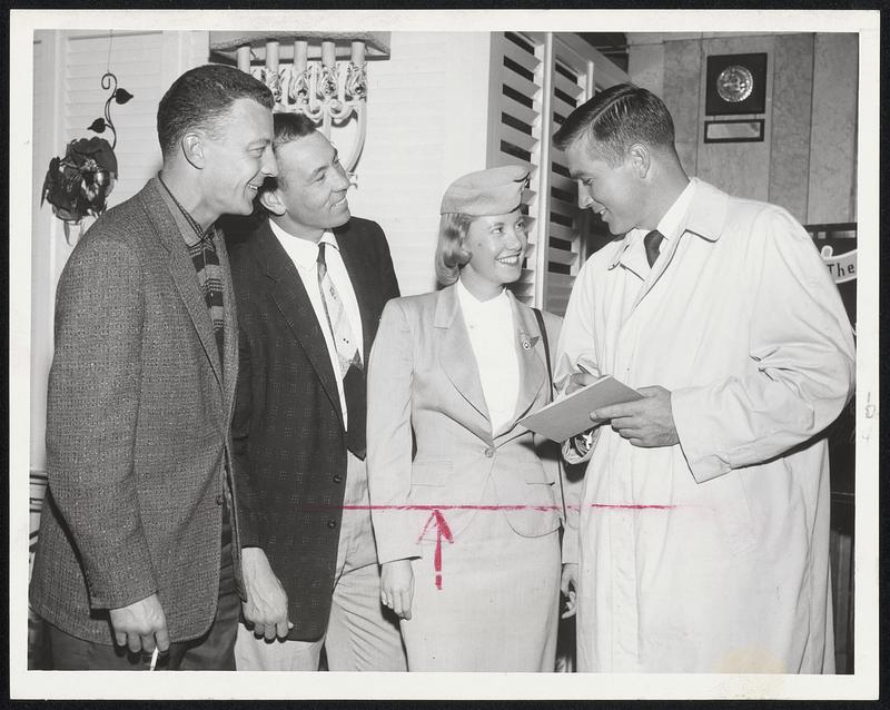 Obliging Visitors from Kansas City accommodate stewardess Beatrice Armato with autographs today in the lobby of the Hotel Kenmore. The smiling members of the KC Athletics who open a three-game series with the Red Sox tomorrow are (left to right) Joe DeMaestri, Bill Tuttle and Frank House.