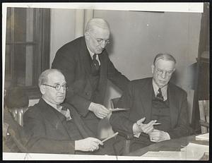 Principals at yesterday's textile conference discussing the present condition of the industry in this state. Left to right, James T. Moriarty, commissioner of labor and industries, chairman; Fred W. Steele, chairman of the National Cotton Manufacturers legislative committee; and Mayor Frederick W. Mansfield, appointed counsel for the group by Gov. Hurley.