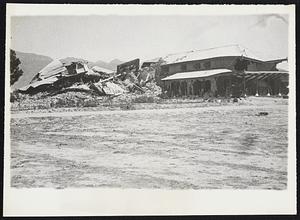 Where Britons Died in Quake Here is the wreckage of the canteen buildings of the Royal Air Force station at Quetta, India, devastated recently by an earthquake in which 26,000 persons died. Of the personel, 44 members of the R.A.F. died. This is one of the first pictures to get through from the 'quake area.