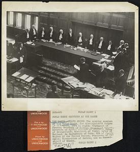 World Court Convenes at the Hague. The opening session of the World Court. The distinguished Judges of the Court, left to right: Fromageot of France; Beichman of Norway; Pessoa of Brazil; Altamira of Spain, Nyholm of Denmark; Huber of Switzerland; Anzilotti of Italy; Loder of Holland; de Bustamente of Cuba; Oda of Japan, Hughes of the United States; Negulecco of Rumania; Novacovitch of Serbia; and de Hammerskjold of Sweden.