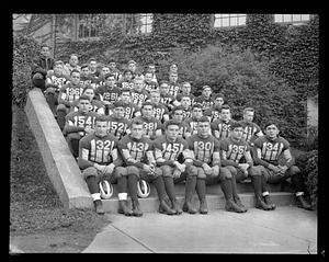 Football players posing in their jerseys