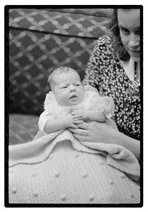 Unidentified baby, possibly in a christening gown