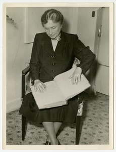 Helen Keller, reading
