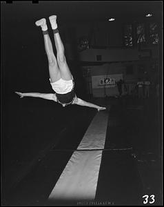 SC gymnast doing a flip in a tumbling run