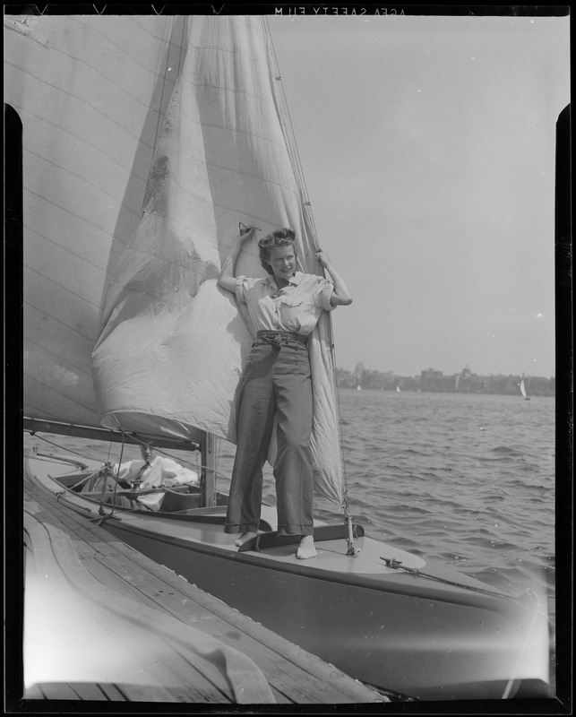 Woman poses on boat