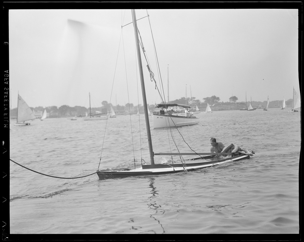 Bailing out sunken sailboat