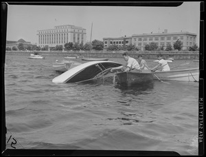 Sailing on the Charles, capsized boat