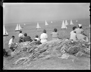 Sailboats with spectators