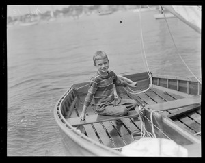 Race week picture Marblehead, MA (boy in a boat)