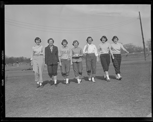 Women softball players (one with Yale sweatshirt)