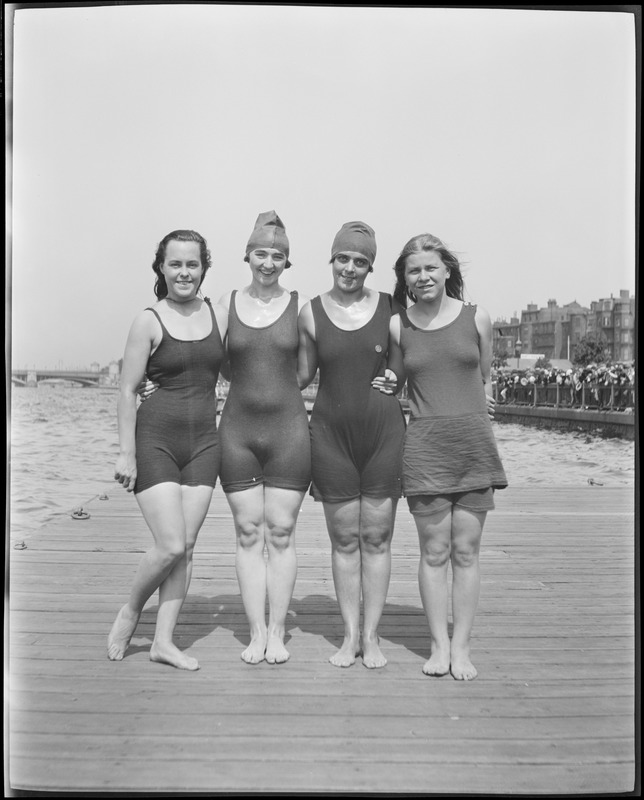 Girls pose for camera at swim competition, Charles River