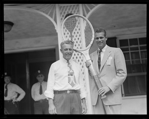 Man with jumbo racket at Longwood