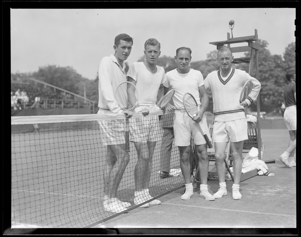 4 men with tennis rackets
