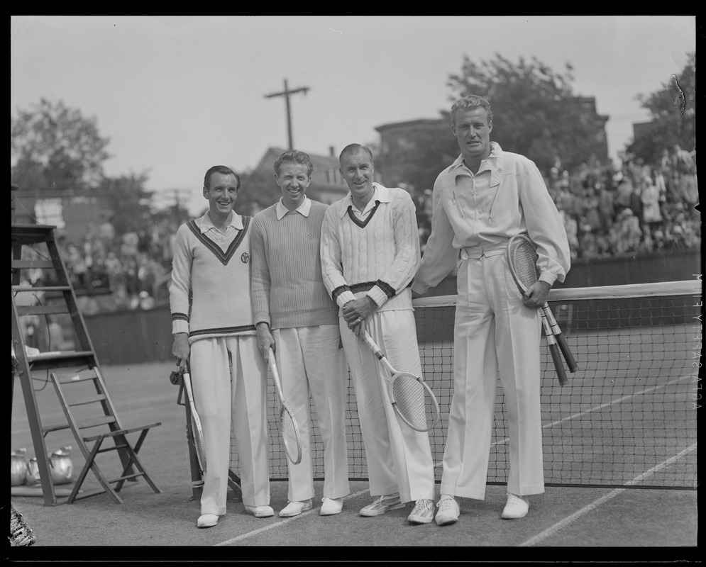 4 men with tennis rackets