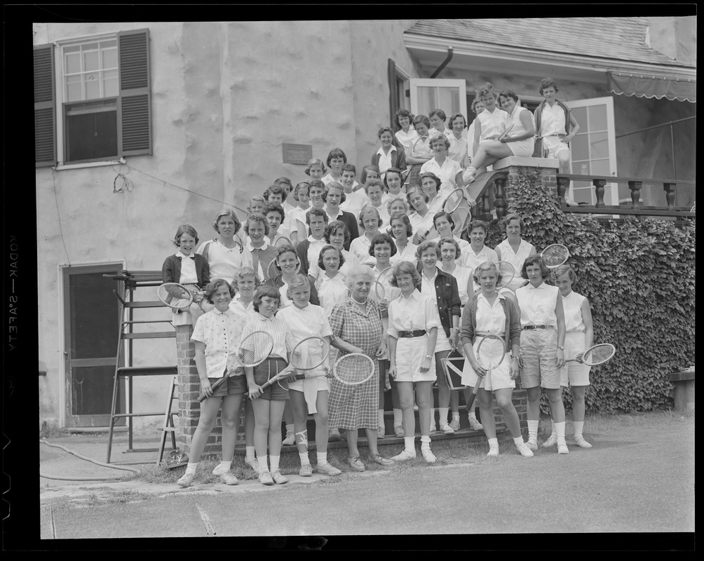 Women in front of clubhouse