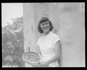 Woman with tennis rackets